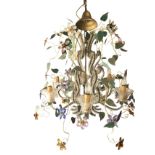 An ornate tutti-frutti chandelier with glass beads and coloured glass flowers mounted on metal