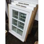 Three new and unfitted double glazed window units, each with six panes in frames with sills. (25.