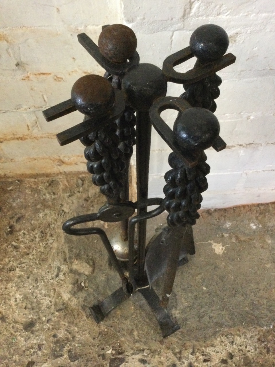 A set of wrought iron firetools on stand, having ropetwist type handles - poker, tongs, shovel & - Image 3 of 3