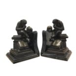 A pair of bronze and marble bookends after Fratin, titled Monkey with Skull, the monkeys seated on