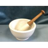 A large Edwardian pestle & mortar, the bowl with shaped spout, the pestle handle of turned
