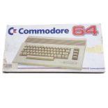 A boxed Commodore 64 personal computer.