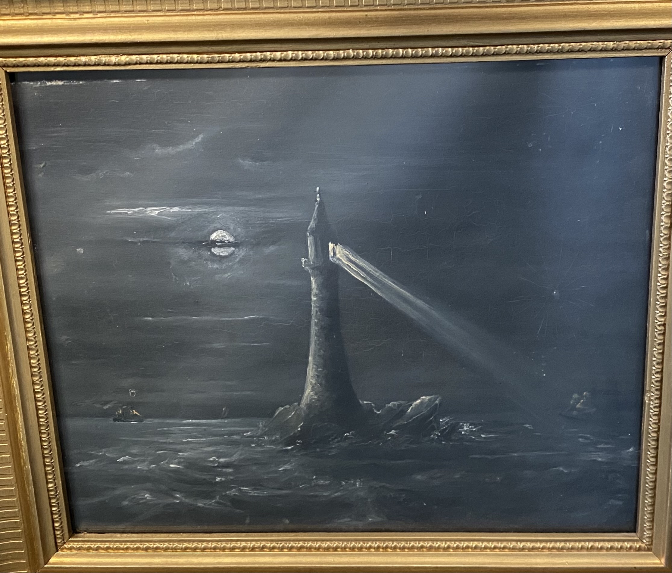 Nineteenth century oil on board, moonlit lighthouse scene with distant vessels, unsigned and in gilt