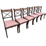A set of six regency style mahogany dining chairs, the bar backs inlaid with crossbanding above