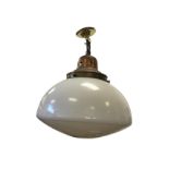 An Edwardian glazed plaffonier, the circular inverted bowl shaped milk-glass shade with copper