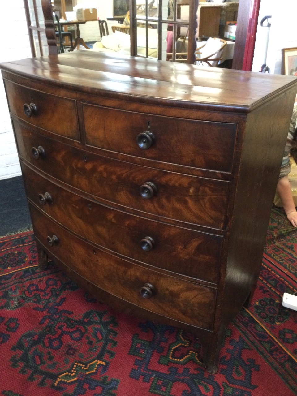 A nineteenth century bowfronted mahogany chest of drawers, with two short and three long graduated - Image 3 of 3