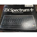 A boxed Sinclair ZX Spectrum+ personal computer.