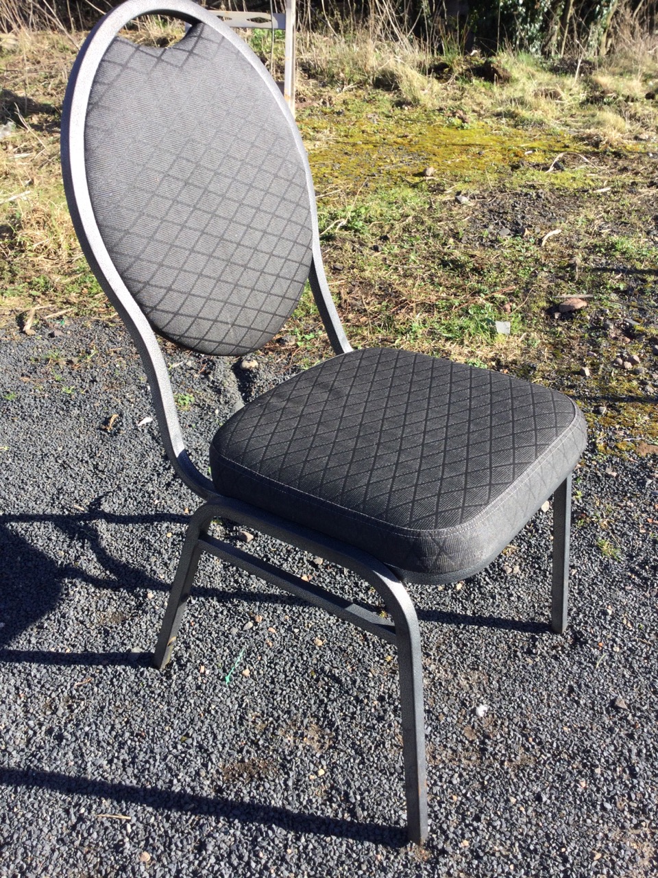 A set of eleven stacking chairs with oval padded backs and cushion seats, raised on square angled - Image 3 of 3