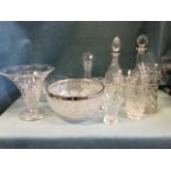 Miscellaneous cut glass including bowls, vases, decanters & stoppers, a large fruitbowl with