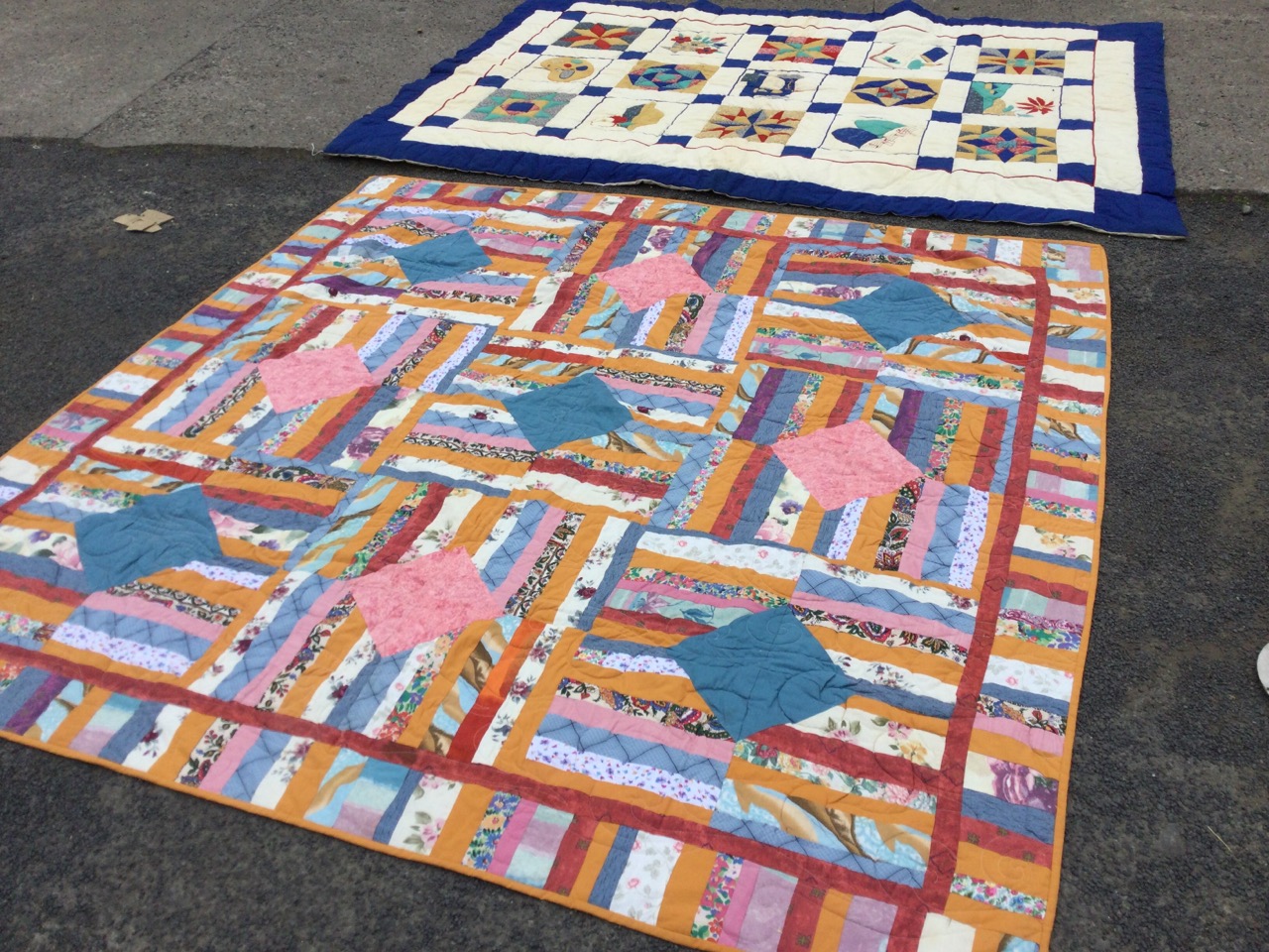 A South African cotton patchwork quilt sewn with colourful panels around square lozenges - 81in x - Image 2 of 3