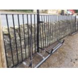 A run of 39in wrought iron railings with square and twisted spindles in rectangular frames with