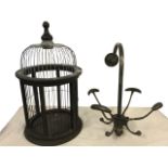 A revolving wall-mounting coat stand with four hooks; and a circular hanging birdcage with domed
