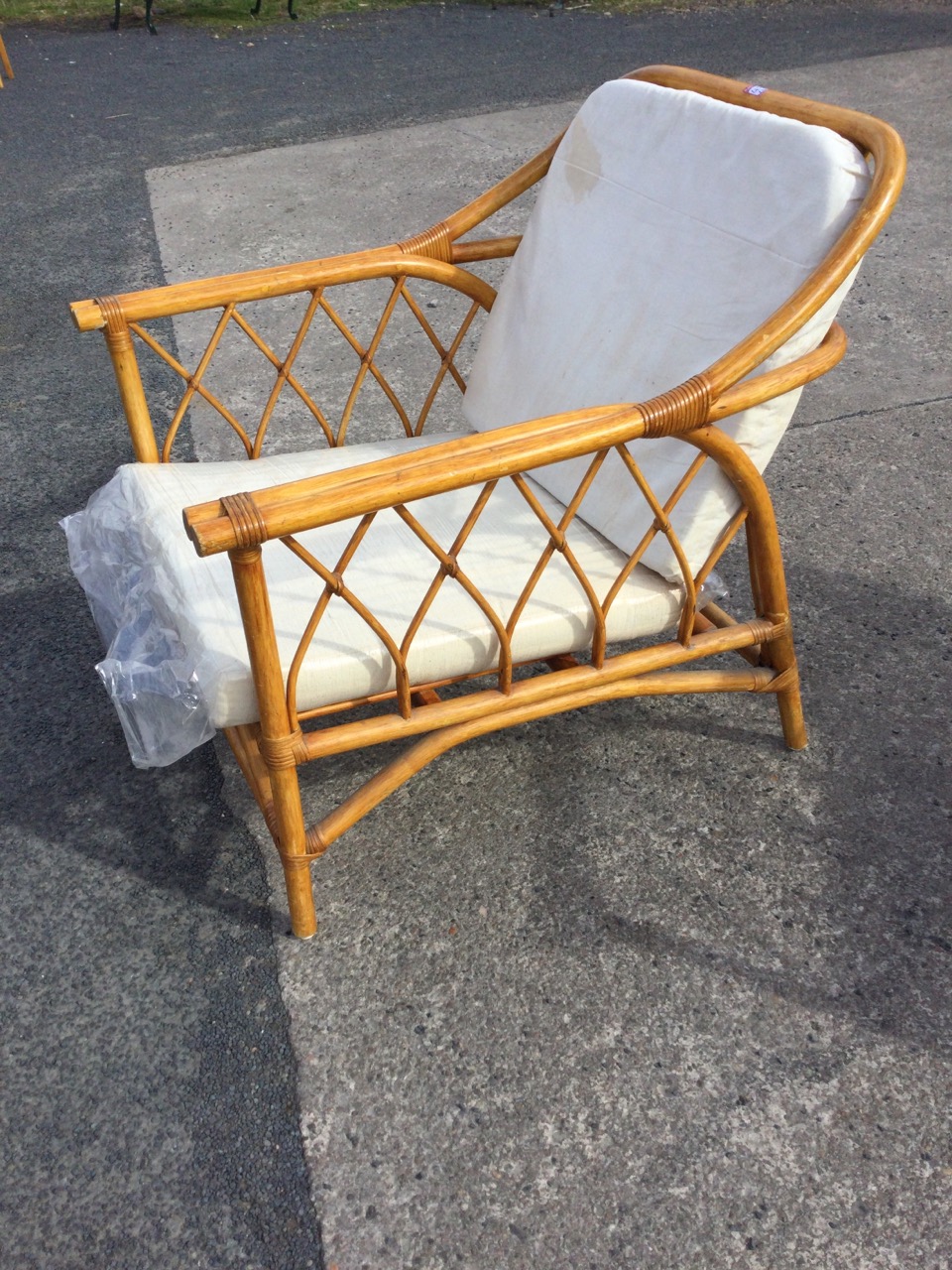 A pair of cane conservatory armchairs with loose linen upholstered cushions, the arms with stick - Image 2 of 3