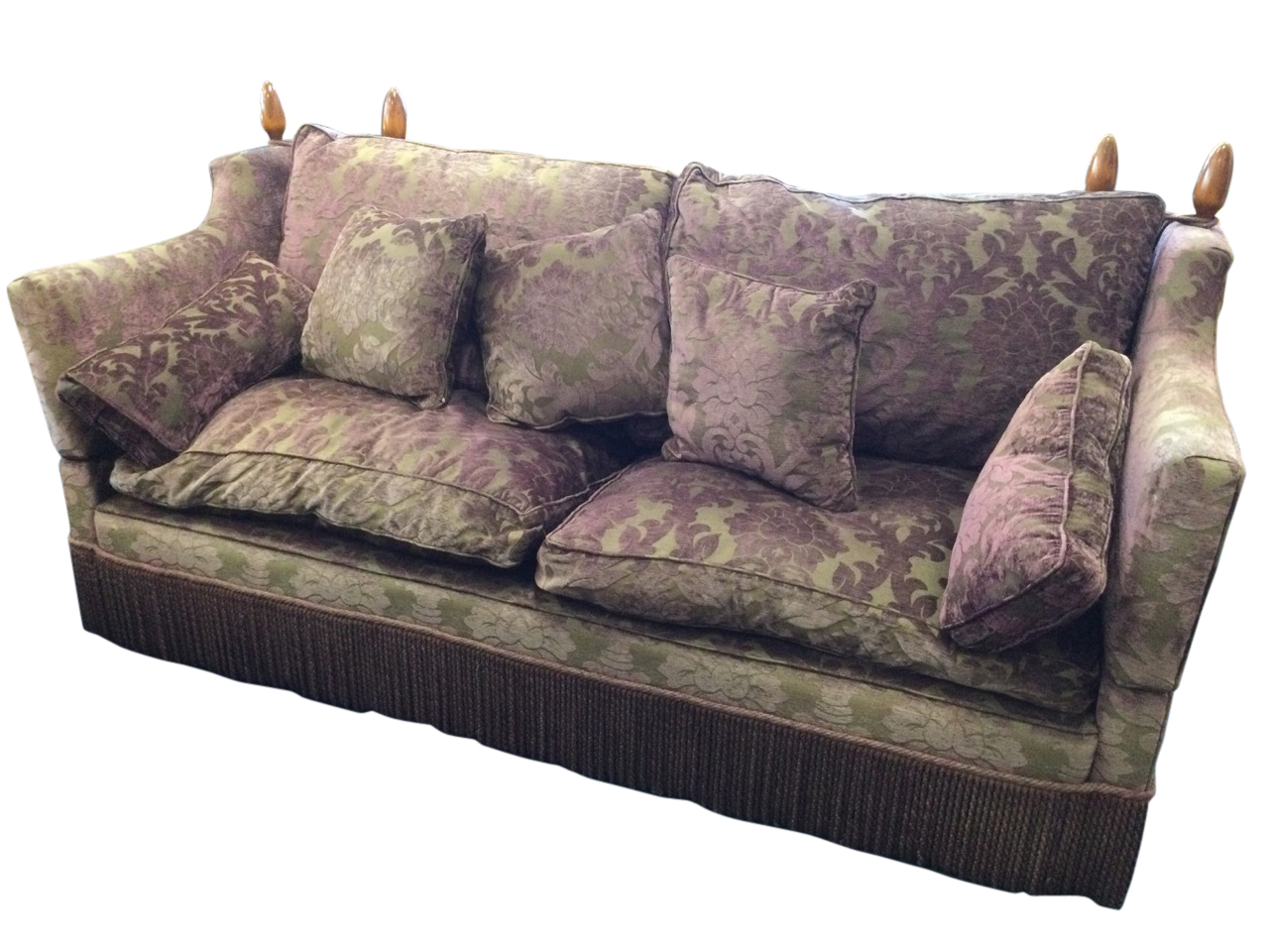 A Knole house two/three-seater sofa with shaped drop arms and loose cushions, upholstered in