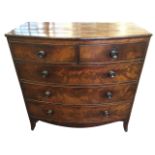 A nineteenth century bowfronted mahogany chest of drawers, with two short and three long graduated