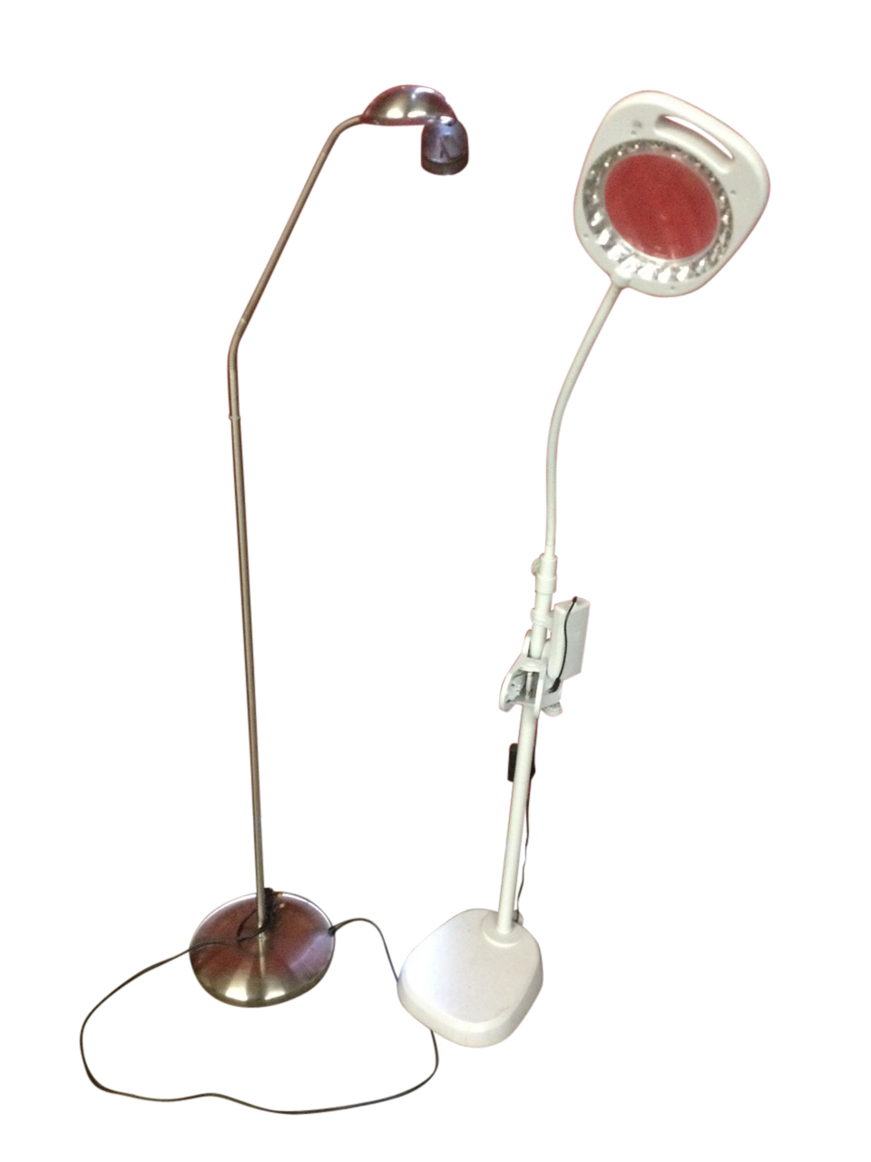 A magnifying electric reading light with adjustable arm on column stand with various attachments;