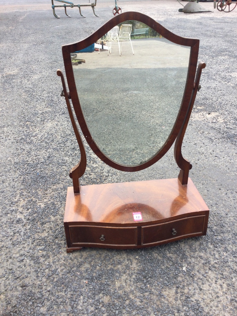 A mahogany dressing table mirror with shield shaped plate on tapering supports above a bowfronted - Image 2 of 3