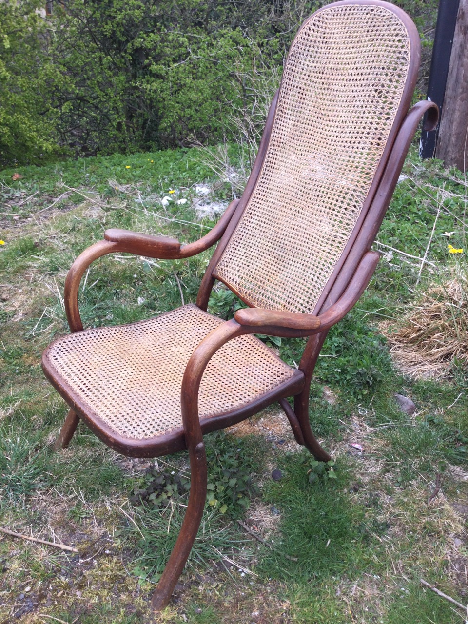 A C20th Thonet bentwood armchair, with rounded high back above shaped arms with armrests, raised - Image 3 of 3