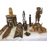 Miscellaneous carved tribal type pieces including figures, an African swordfish, shields, a zebra