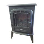 A Beldray electric stove style heater with glass door enclosing faux coals, raised on angled