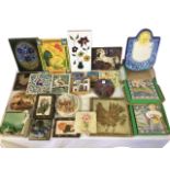 A quantity of tiles, some boxed sets, majolica, handpainted, relief moulded, Spanish, wallplaques,