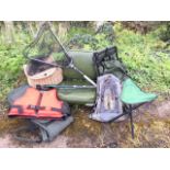 Miscellaneous fishing gear including a boat seat, a rod bag, a fishermans waistcoat, a stool, a life