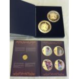 A cased set of four Lady Diana medallions; and a cased pair of large heavy 4in gilt plated Elizabeth