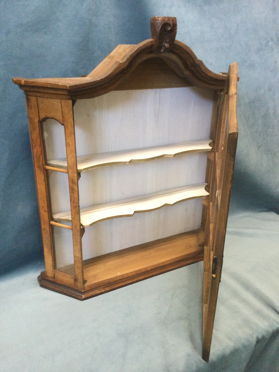 A walnut display cabinet with carved arched moulded cornice above an astragal glazed door - Image 2 of 3