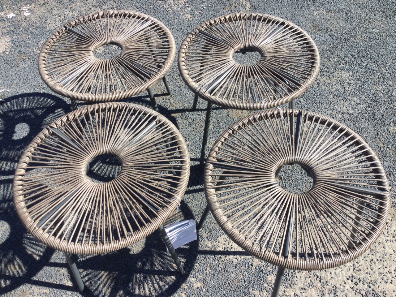 A set of four new circular outdoor stools, with strung seats on metal frames with angled legs. (4) - Image 2 of 3