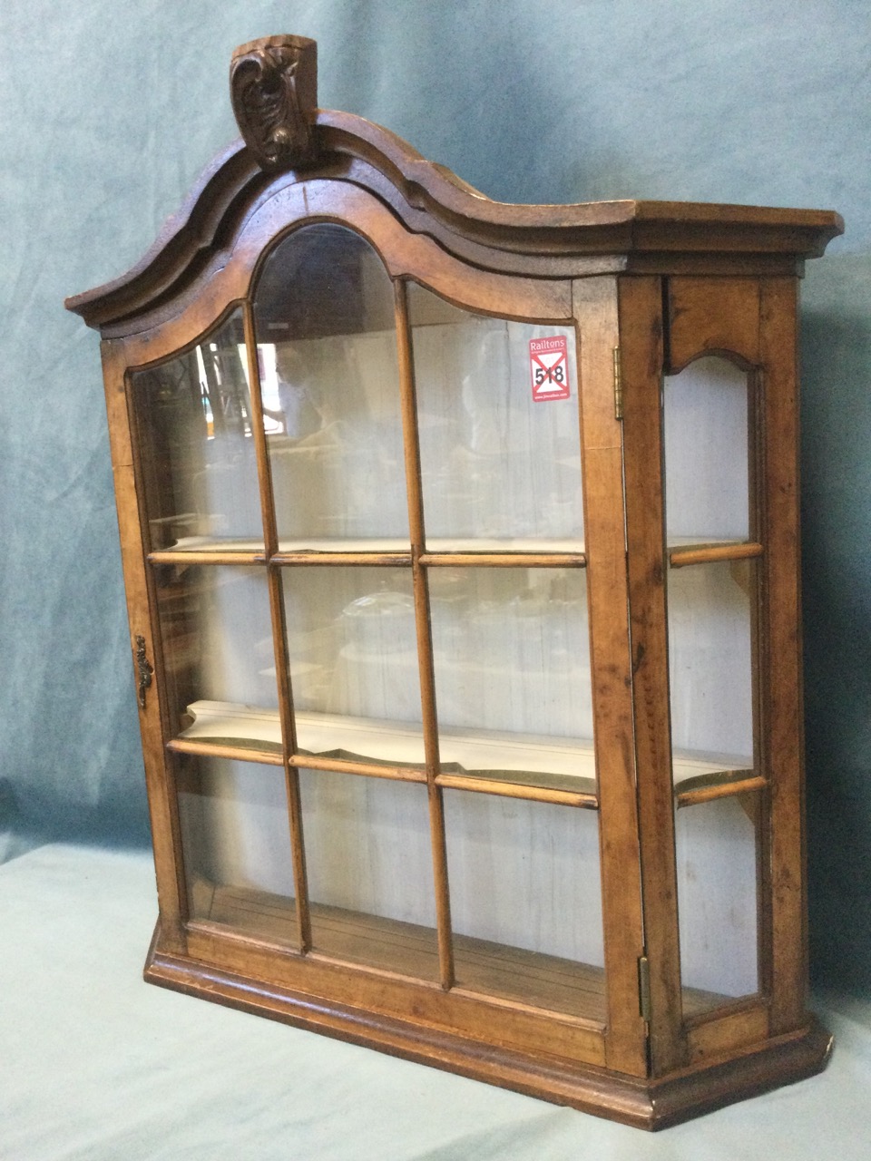 A walnut display cabinet with carved arched moulded cornice above an astragal glazed door - Image 3 of 3