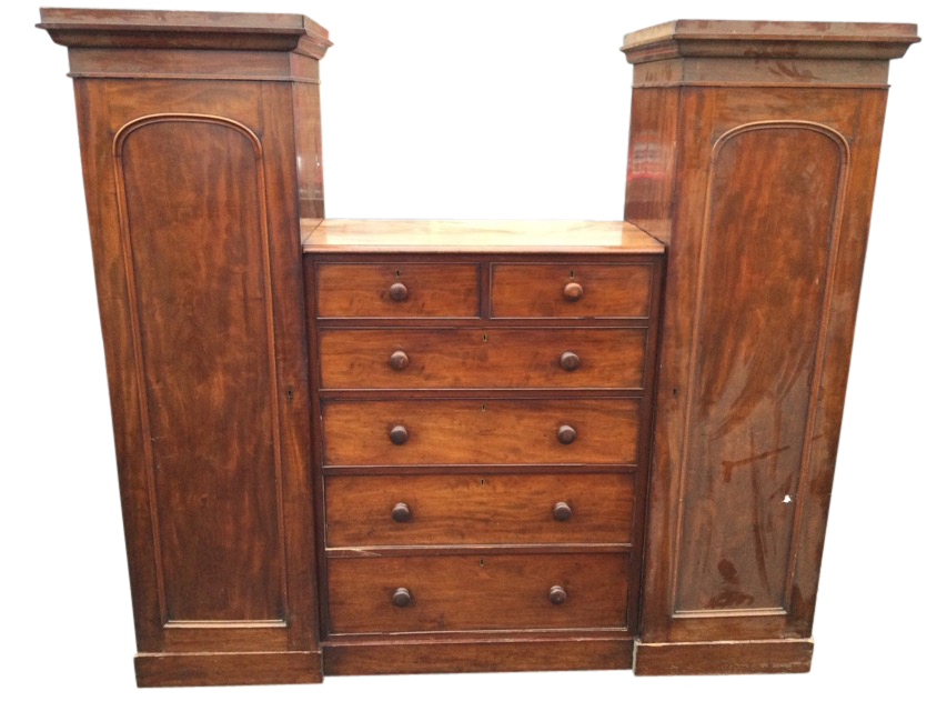 A nineteenth century mahogany sentrybox wardrobe, with pair of arched panelled door hanging