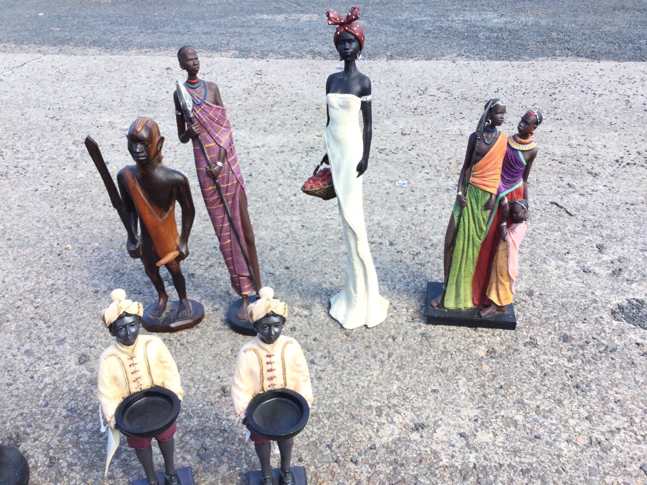 Four African tribal type figurines; a pair of Egyptian style lion vases; and a pair of blackamoor - Image 3 of 3
