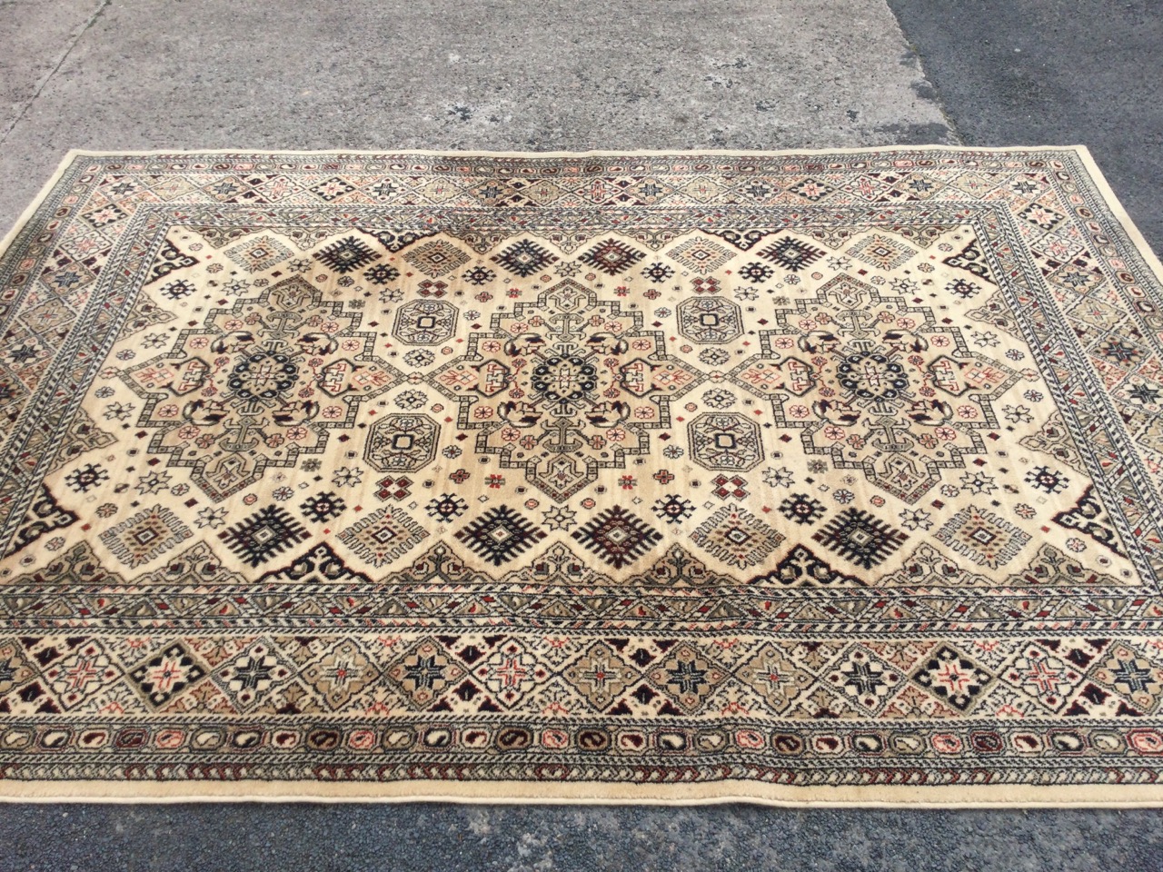 A Belgian eastern style rug woven with three oval stepped medallions on fawn field bordered to sides - Image 3 of 3