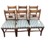 A set of six regency style mahogany dining chairs, the bar backs inlaid with boxwood & ebony