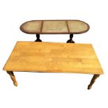 A rectangular hardwood coffee table, the moulded top on turned legs - 44in; and another with