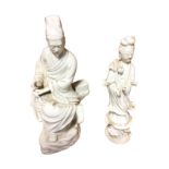 A C20th blanc-de-chin porcelain figure of a seated Chinese gentleman holding leaves; and another