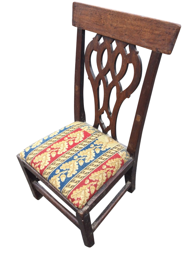 A nineteenth century mahogany childs chair with later alterations, back rail above a pierced splat