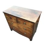 A nineteenth century mahogany chest of drawers, the crossbanded top above two short and two long