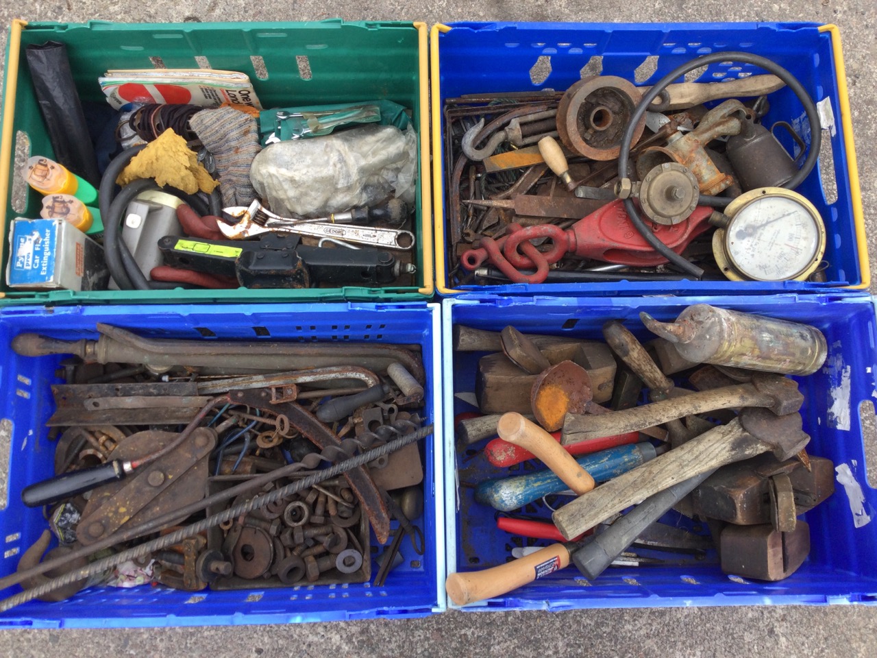 Miscellaneous tools including axes, spanners, pulleys, a jack, pumps, a pressure gauge, nuts &