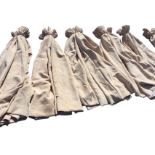 Four pairs of fawn suede type 54in. lined curtains, and one single and another longer 74in. pair. (