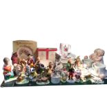 Miscellaneous childrens figurines, Wedgwood baby feeding bowls, a Royal Doulton boxed plate, Nao,
