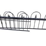 Four sections of unused wrought iron dwarf railing with fleur-de-lils finials in arches. (71.25in