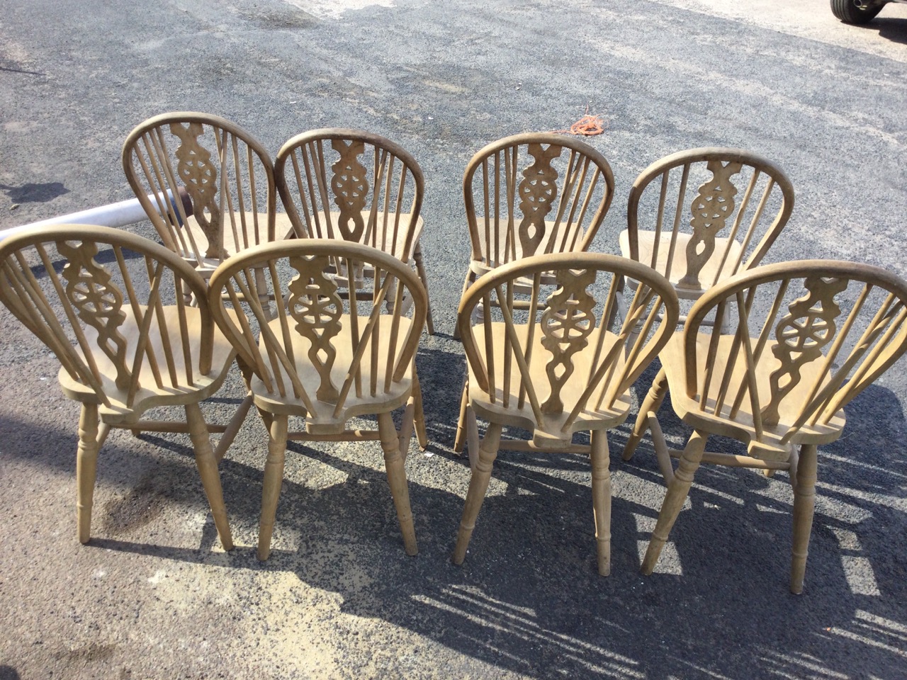 A married set of eight wheelback kitchen chairs, the arched backs on spindles with pierced splats - Image 3 of 3