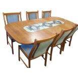 A 70s Danish Farstrup Møbler dining room suite with six upholstered chairs on rectangular legs,