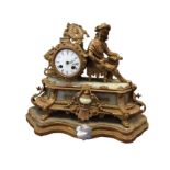 A Victorian French style gilt spelter & marble clock, the stand with presentational shield dated