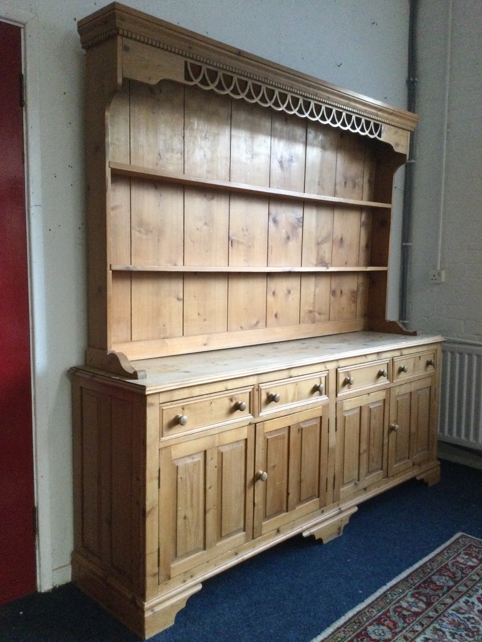 A pine dresser, the delft rack with moulded dentil cornice above a pierced fretwork apron, having - Image 2 of 3