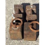 Two nineteenth century cast iron hundredweight weights with Imperial Standard marks dated 1828;