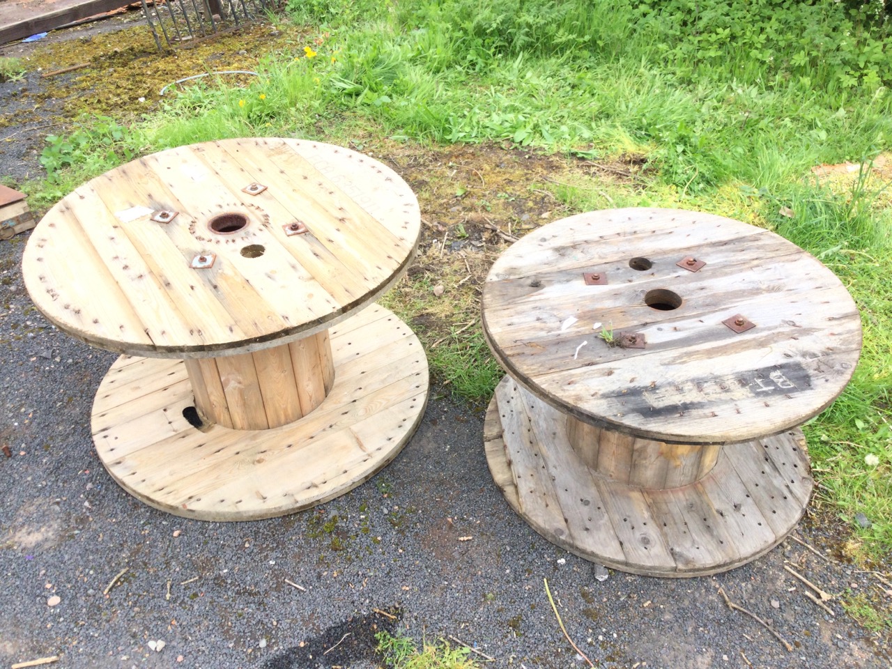 A 3ft pine cable drum suitable for a garden table – 37.25in x 23in; and another slightly smaller –