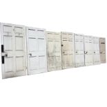 A set of eight Georgian fielded panelled doors from a Coldstream townhouse, all with their