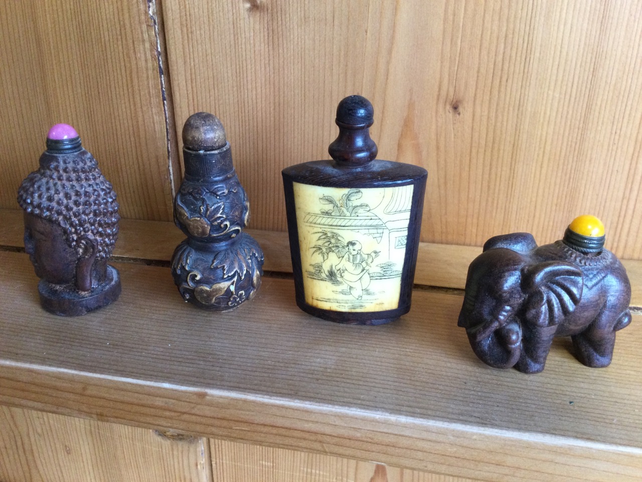 A carved wood snuff bottle with buddha head to sides; another carved hardwood bottle in the form - Image 2 of 3